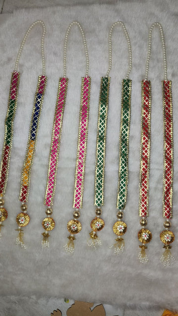 Swagat phatka with moti checks and tassels for wedding welcome