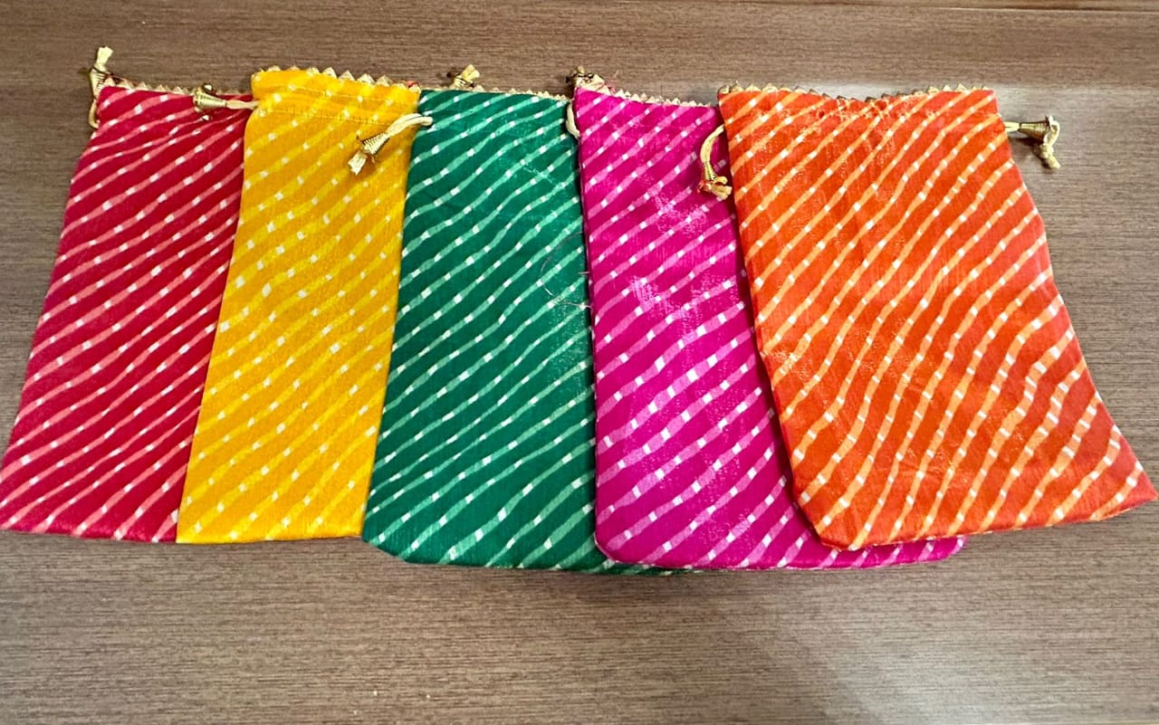 Handmade Indian Lehriya potli pouch in vibrant Rajasthani design, perfect for bridal functions and cultural celebrations.