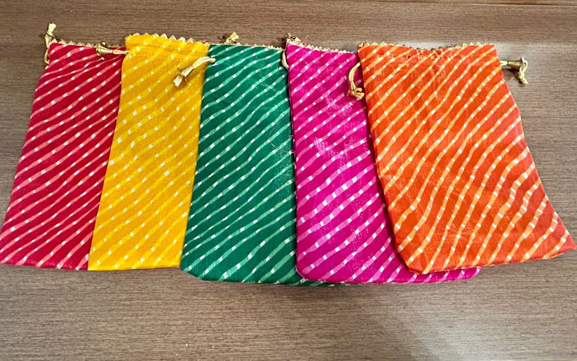 Handmade Indian Lehriya potli pouch in vibrant Rajasthani design, perfect for bridal functions and cultural celebrations.