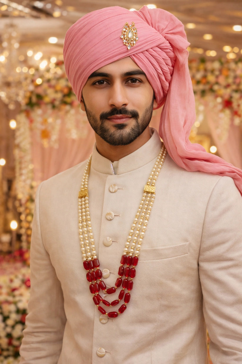 Traditional moti mala for bride and groom welcome at Indian wedding