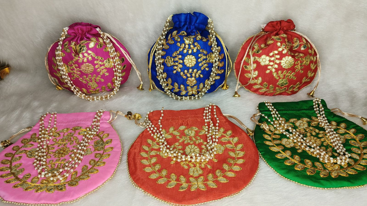 Traditional Indian potli bag with gota patti work and pearl handle