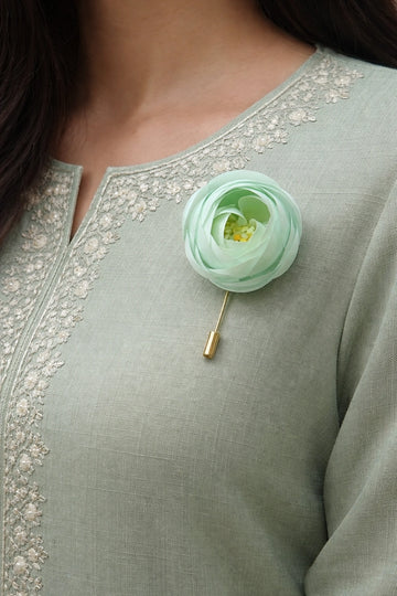 Traditional white flower lapel pin for groom outfit