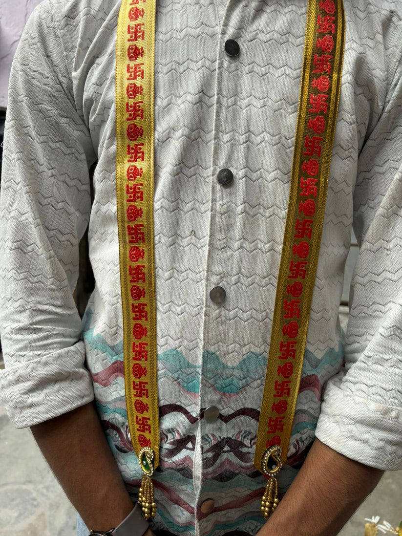 Groom welcome patka with auspicious sathiya symbol for haldi and baraat