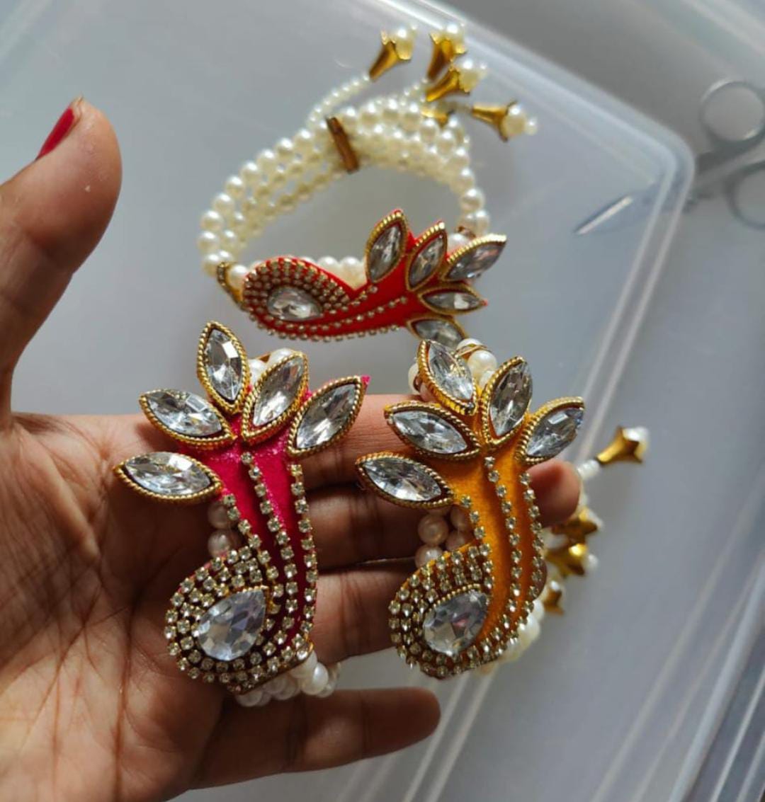 Designer pearl kundan paisley bracelet for festive and wedding wear for women