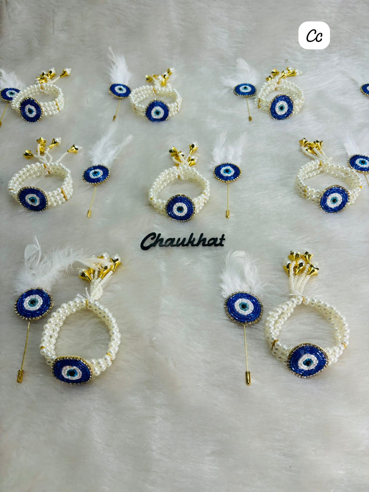 Evil eye protection brooch with matching bracelet designed for positive energy and stylish wear