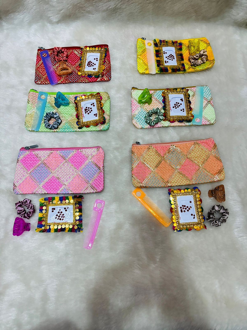 Traditional hand purse with bindi storage pocket for weddings and festivals