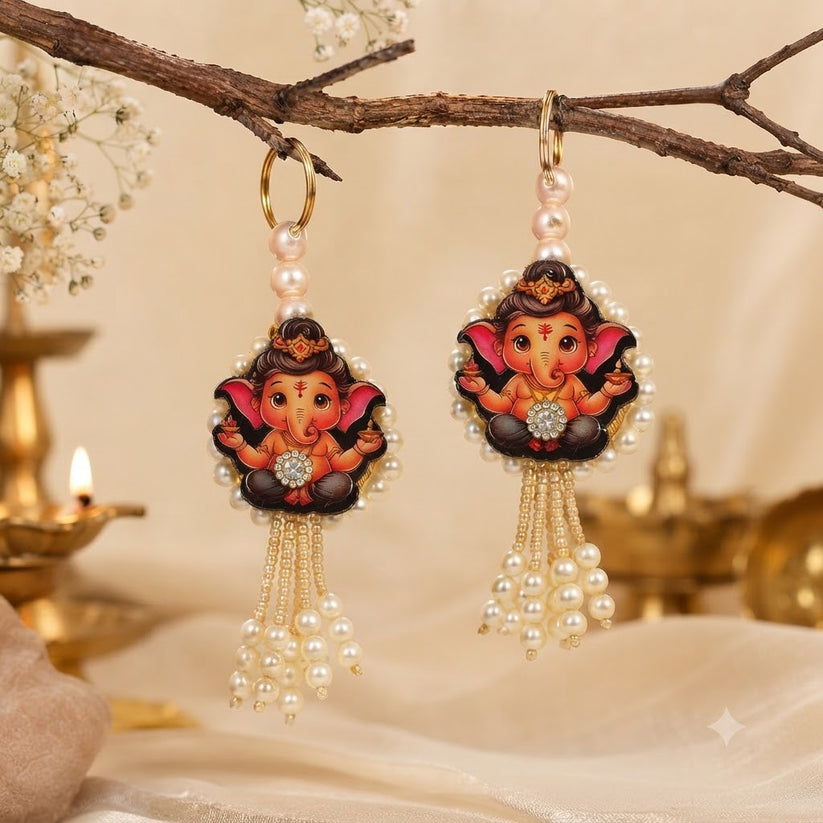 A pair of 5-inch handcrafted Ganesh Shub Labh hangings designed for festival door decoration and traditional home gifting