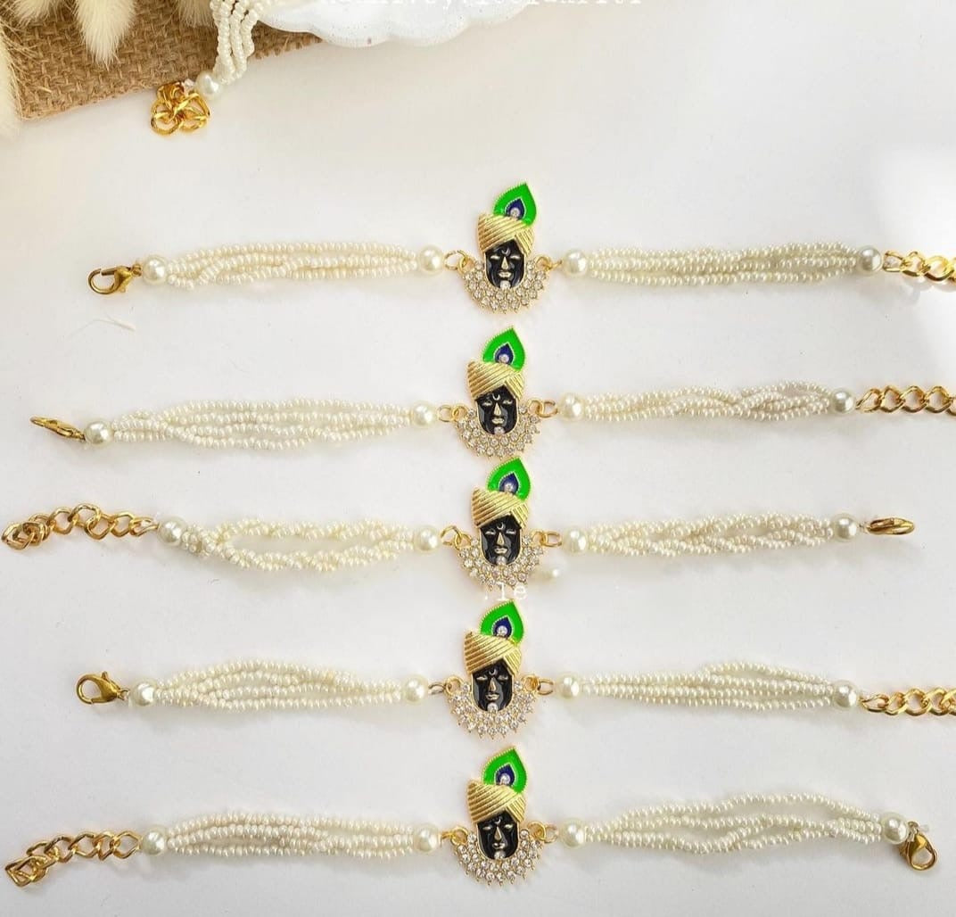 Handcrafted Shrinathji pearl bracelet featuring kundan work, ideal for pooja, festive wear, and spiritual gifting