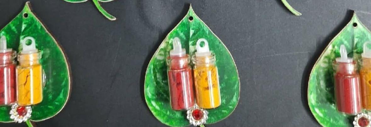 Paan leaf shape haldi kumkum cutout used for traditional puja and wedding ceremonies