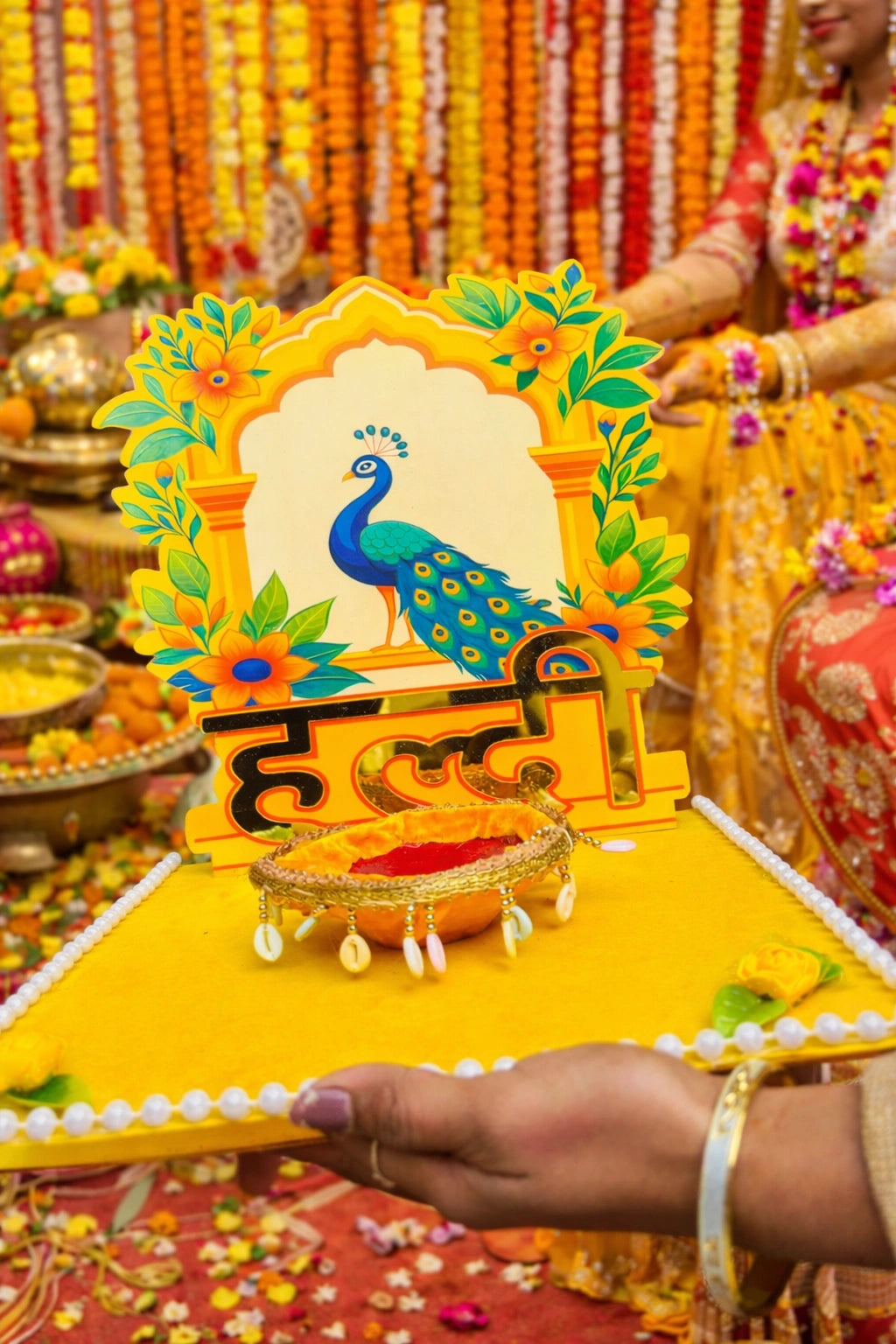 designer bridal haldi platter with peacock design background for wedding rituals