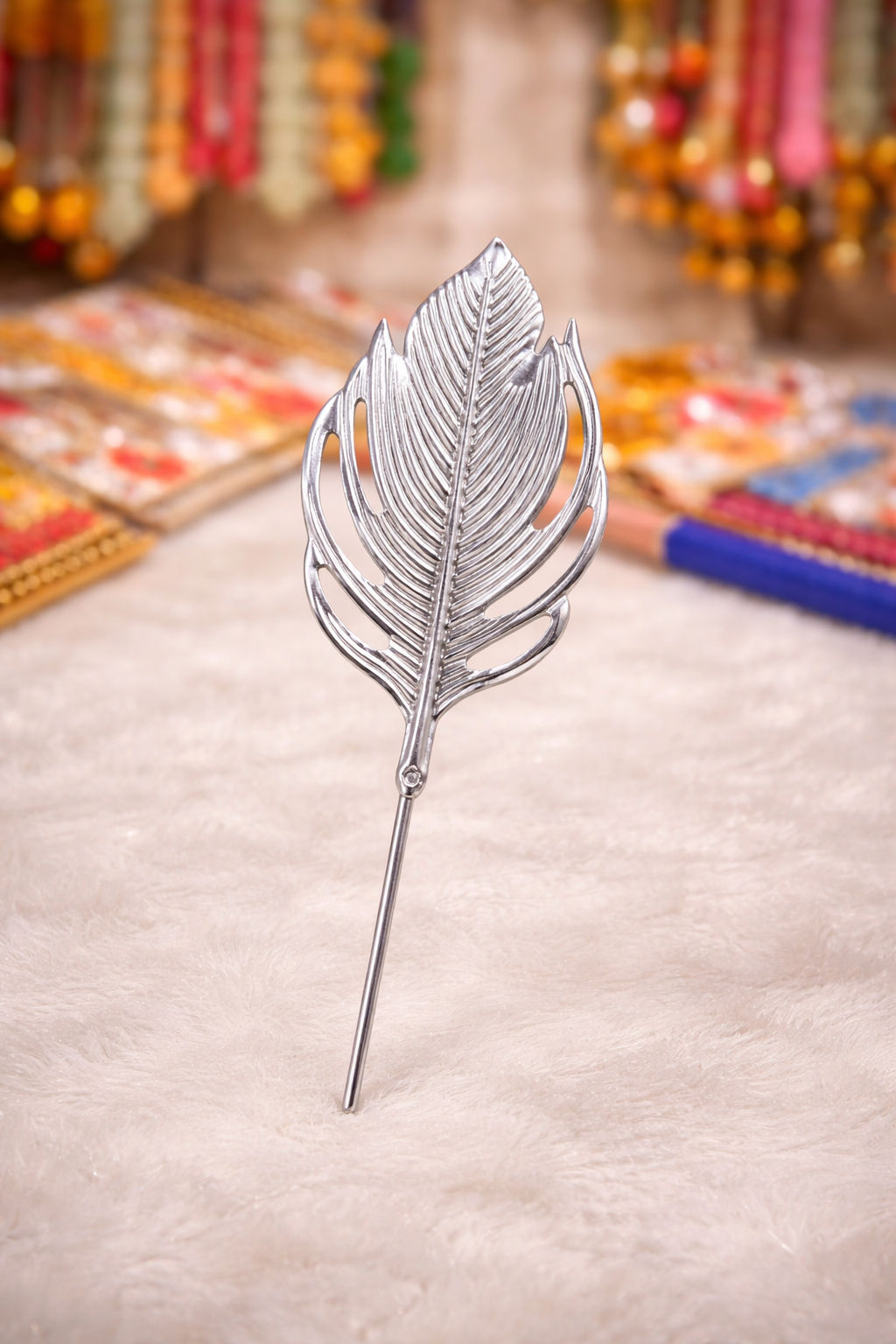 Silver finish decorative leaf used for pooja thali and traditional home decor.