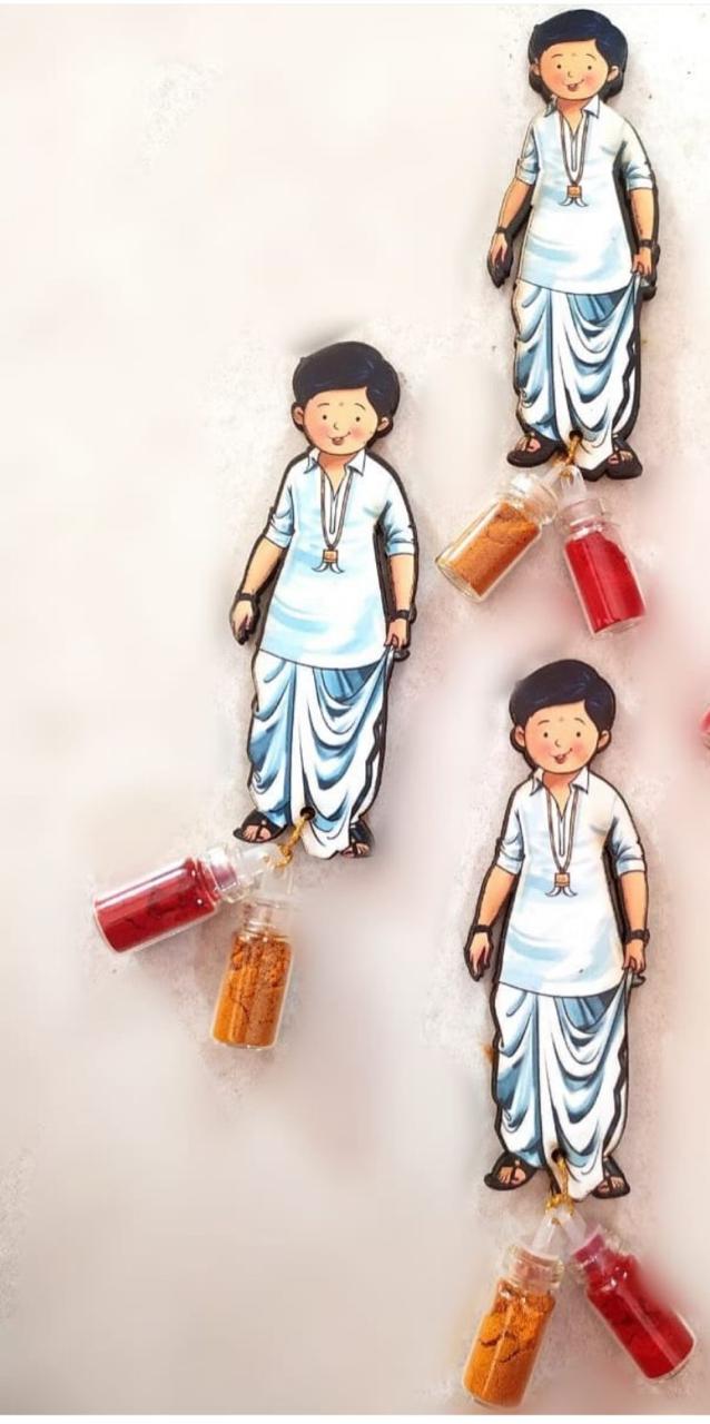 Traditional Marathi boy cutout holding haldi kumkum bottles for pooja, wedding, and festive ceremonies