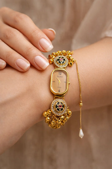 women wearing traditional bracelet watch with pearl tassel